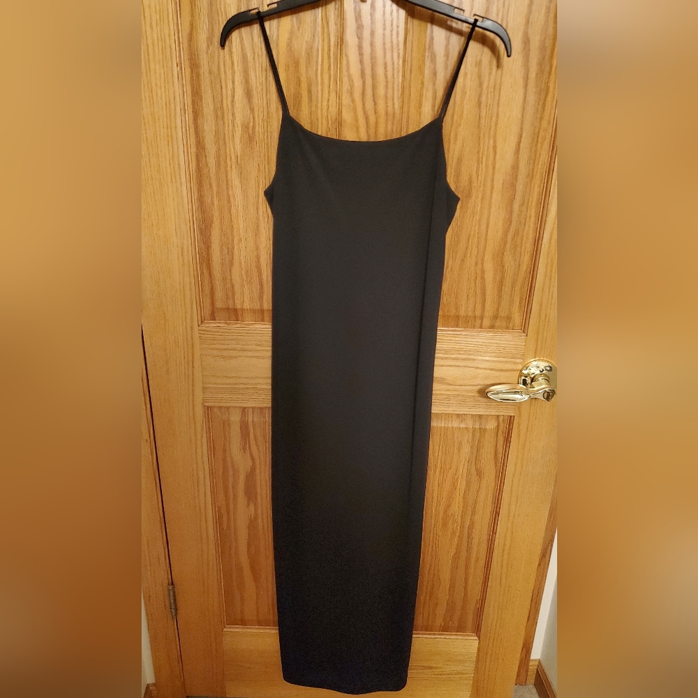 Long black dress with side slits and back details